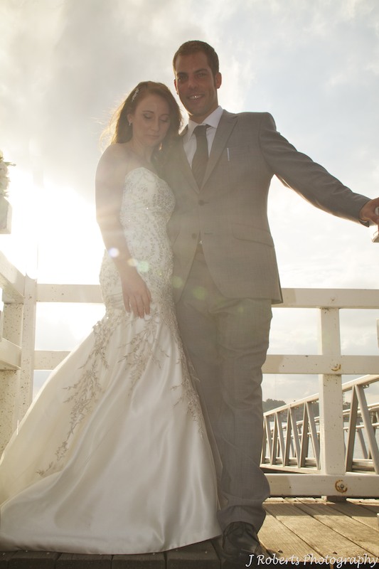Bride and groom with setting sun - wedding photography sydney